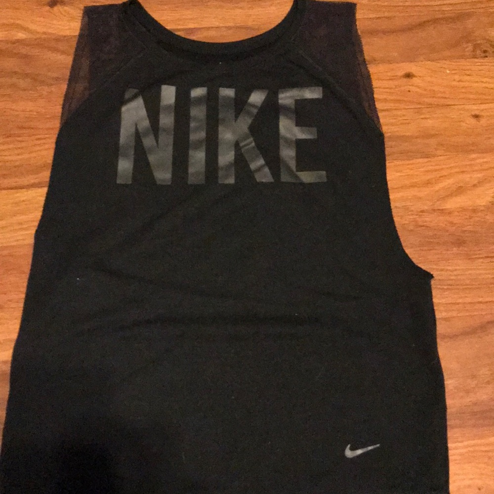 Nike muscle shirt , all black no sleeves no rips